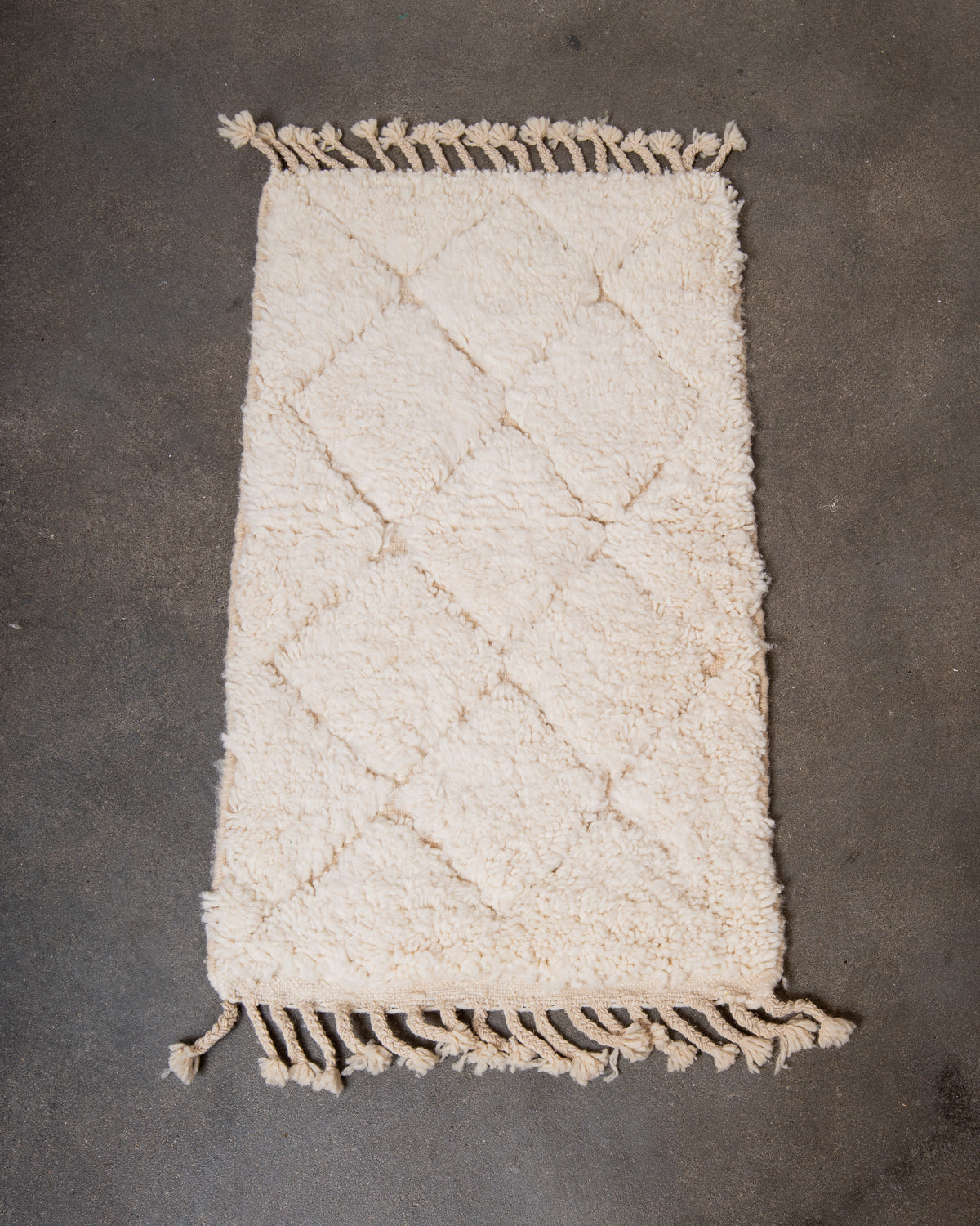 Modern, designer, handcrafted Berber rug from Morocco. Beniourain carpet with beautiful colours and patterns and fluffy wool texture.